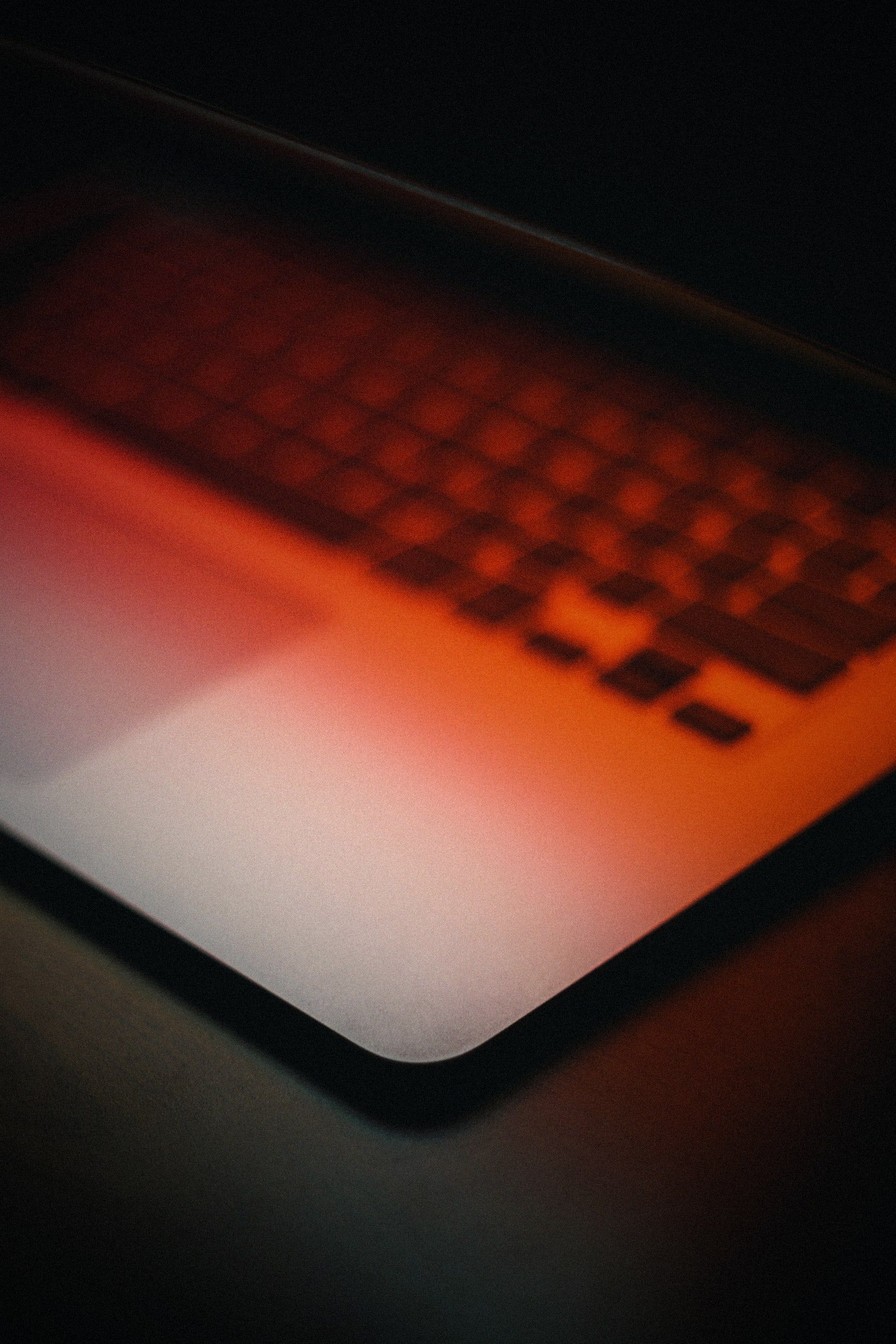 A keyboard in warm orange light, close up